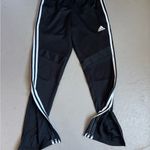 Adidas  Women’s Black Joggers with White Stripes Photo 1