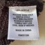 Wonderly  Women's Classic Black Rib Knit Fringe 2 Tier Hem Sleeveless Sweater Photo 12