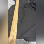 Jennifer Lopez Black Jumpsuit with Belted Waist Photo 6