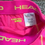 Head  hot pink athletic shorts Photo 2