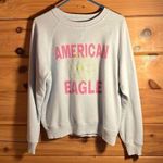 American Eagle Women’s long sleeve blue, yellow, and pink Photo 0