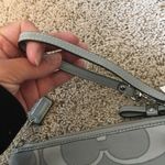 Coach signature fabric gray / silver oversized wristlet NWT Photo 9