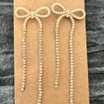 Elegant Gold Bow Earrings Photo 0