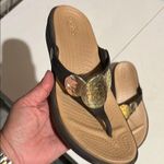 Crocs  Women's Brown and Gold Sandals size 6 vacation, summer, beach Photo 2