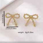 Elegant Gold Bow Earrings Photo 4