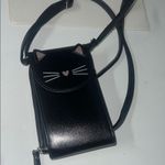 Stylish Black Crossbody Bag with Cat Design Photo 0