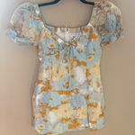 Showpo puff sleeve mini dress with a blue and yellow floral pattern Photo 0