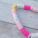 Pink & White Stretch Bracelet with a Smiley Face Photo 3