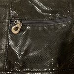 Fabulous preloved handbag 4 outside pockets adjustable strap 1 inside pocket GUC Black Photo 3