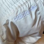 Adidas NWOT  Cream Track/Jogger Pants with ICONIC Side Stripes Size Medium Photo 3