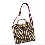 Zebra style print with red and gold accents shoulder tote purse. Patent leather Black Photo 1