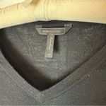 BCBGMAXAZRIA  Black Asymmetrical V-Neck Long Sleeve Blouse Photo 1