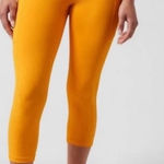 Athleta  Ultimate‎ Stash II Capri Leggings Yellow Size Medium Photo 0