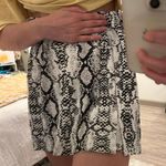 laura's boutique Snake Print Skirt Photo 1