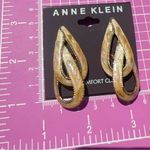 Anne Klein gold tone beige cream reflective amber double cross teardrop earrings Photo 4