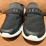 Skechers  Men's Black and White Slip-On Loafers Photo 1