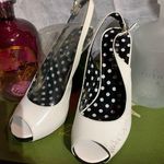 Colin Stuart  White Black Heels Photo 1