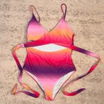 Pink Lily One-piece multi-colored swimsuit in size S •  Photo 0