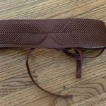 B-low the Belt  brown belt Photo 0