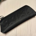 SKIMS NWT Neoprene long zip pouch Photo 0