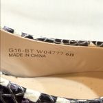 Cole Haan Grand.OS Snakeskin Leather Heels
Size 6 | Black White Python Print Photo 5