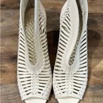 Vince Camuto  White Heeled Boots with Peep-Toe Design Photo 1