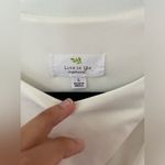 NWT Live in the moment White Body Suit size large with small cut out Photo 2