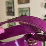 Ted Baker bag in beautiful purple. floral lining with snap closure Photo 9