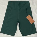 Girlfriend Collective  COMPRESSIVE HIGH-RISE
BIKE SHORTS, GREEN  SIZE: M Photo 1