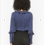 NUDE Polka Dot Ruffle Long Sleeve Thong Bodysuit Photo 3