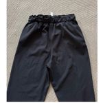 Lululemon  Women's Keep‎ Moving Woven Black Drawstring Lightweight Pants Size 6 Photo 4