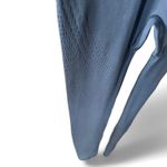 Lululemon black bodysuit with laser cut outs, rare size 6 yoga Size M Photo 4