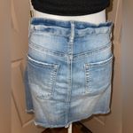 Indigo Rein  medium/light was distressed button front denim mini skirt. Photo 8