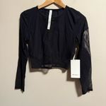 Lululemon NWT Mesh Panelled Training Long Sleeve Shirt
Black- Size 8 Photo 2