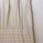 Yellow and white stripe romper Size M Photo 1