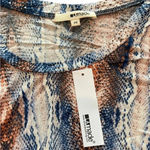 LA Made  python shirt in XS, this is NWT Photo 1