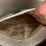 Stone Mountain Versatile White and Black Crossbody Bag with Adjustable Strap Photo 6