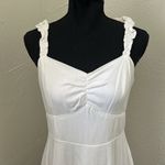 Miami  White Mini Dress w/ Smocked Back and Ruffle Sleeves Photo 4