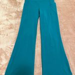 Athleta  Salutation Stash Flare Pants Emerald Green Photo 3