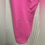 Fabletics Women’s PowerHold High Rise Leggings Pink Leopard Crisscross Back Photo 2