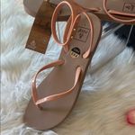 REEF Pink and Cream Sandals with Strappy Design Photo 1