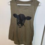 Here's a cute olive green tank top with a cow graphic on the front! It's a fun and casual piece to add to your wardrobe. Only worn twice. Size M Photo 0