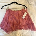 Urban Outfitters Pink Lace Mini Skirt Photo 1