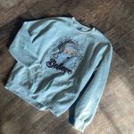 Gildan Cheetah Santa Christmas Believe Crewneck Sweatshirt Photo 1