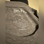 Harry Potter EUC  Grey Hogwarts Houses tee size medium Photo 3