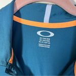 Oakley ✨  Women’s Teal Polo Shirt Medium Photo 2