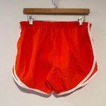 Nike  Dri-FIT Tempo Running Shorts Women’s Small Orange White Trim Athletic Photo 2