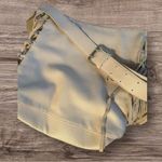 Expressions NYC Vegan Leather w/ Suede Fringe Crossbody Bag in Cream. Photo 2