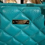 Kate Spade New York quilted tote bag in teal. Photo 1