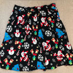 Christmas, Santa, Snowman, and snowflake holiday print skirt in size XL Photo 0